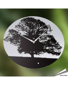 KOOKOO Tree is een moderne klok met vogelgeluid. De wijzerplaat toont een grote boom op een ovale glasplaat (5mm sterk).